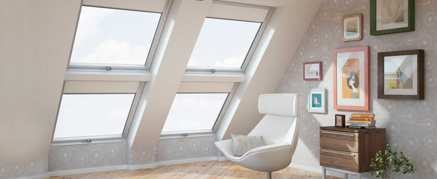 Мансардные окна с рулонками Roof System в интерьере